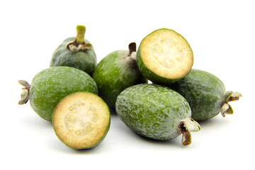 Feijoa fruit or whole and half pineapple guava isolated on white