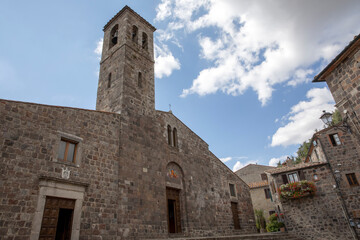 Fototapeta na wymiar Radicofani (SI), Italy - August 15, 2021: San Pietro church facade in Radicofani village, Tuscany, Italy