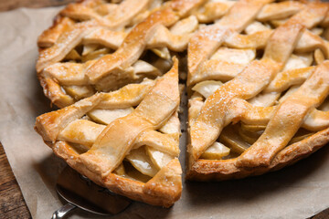 Delicious traditional apple pie on table, closeup