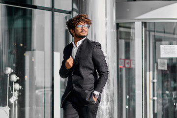 a businessman rushes to the office for a meeting