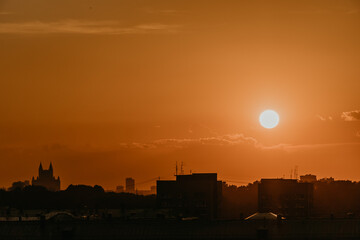 The sun rises over the skyline of Moscow