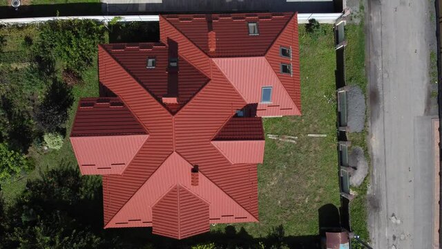 Modern roof made of metal. Corrugated metal roof and metal roofing.