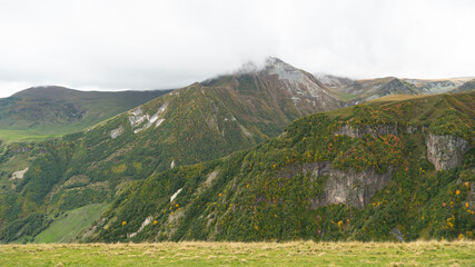 beautiful view of large green hills