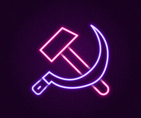 Glowing neon line Hammer and sickle USSR icon isolated on black background. Symbol Soviet Union. Colorful outline concept. Vector