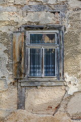 Fototapeta na wymiar Old window from the outside