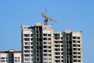 Fototapeta premium The architectural complex of residential buildings on sky background