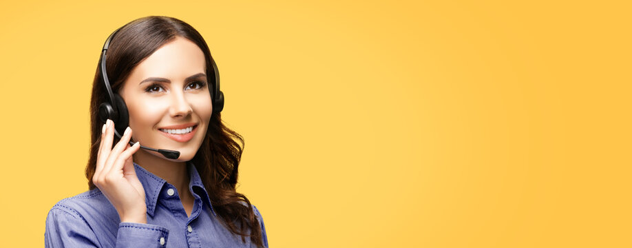 Contact Call Center Service. Customer support, female sales agent. Caller or answering phone operator or businesswoman. Looking up woman in headset at studio image. Yellow background.