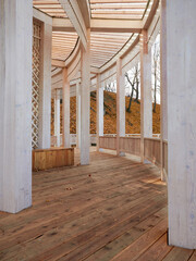 wooden gazebo in the autumn park