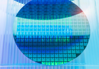 Silicon Wafer with microchips used in electronics for the fabrication of integrated circuits.