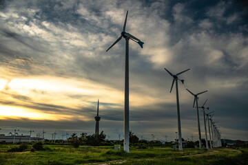 Fototapeta na wymiar Wind turbines used to generate electricity in Laem Chabang deep sea port, Thailand