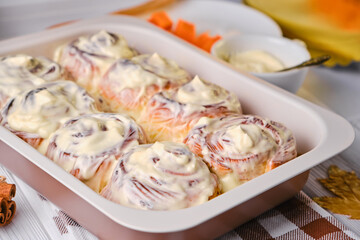 Seasonal autumn homemade pastry - cinnabons with cream cheese