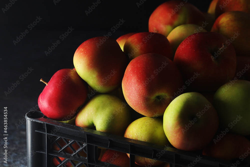 Poster A box with ripe apples	