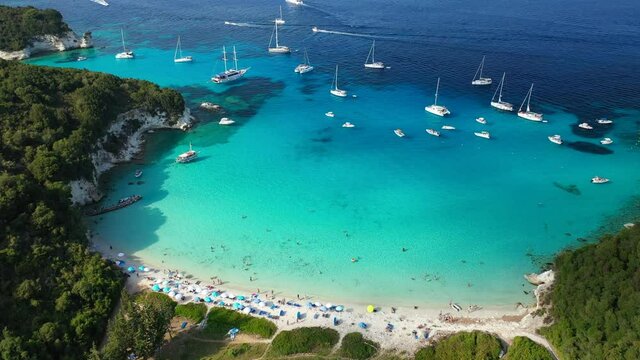 Aerial drone video of tropical paradise turquoise bay and sandy beach in popular Mediterranean destination island