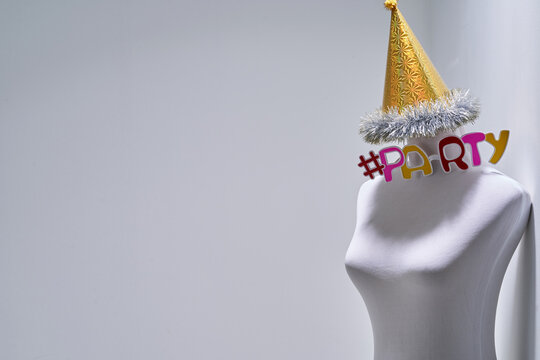 retro style mannequin with party hat