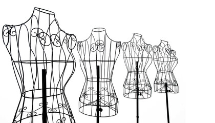 Group of tylish wire tailor's mannequin isolated on white
