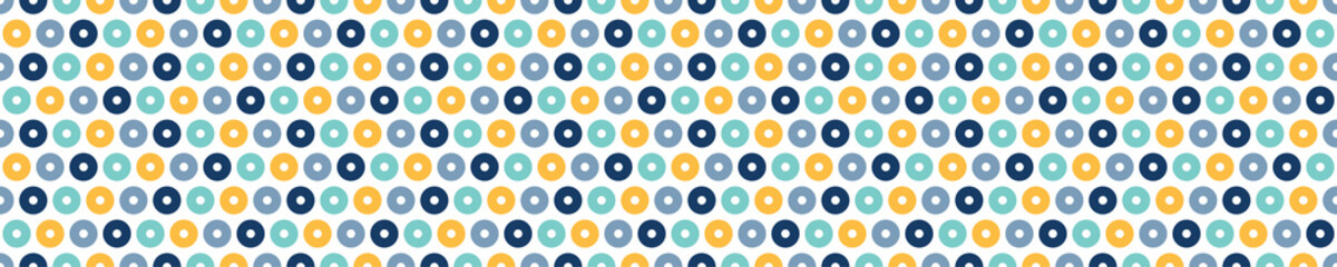 Seamless pattern with yellow and blue circles. Cute and childish design for fabric, textile, wallpaper, bedding, swaddles or gender-neutral apparel.