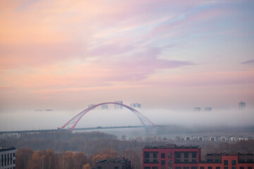 Bugrinsky bridge in winter foggy morning