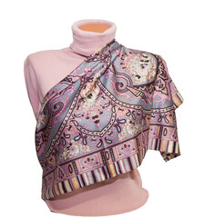 Women's silk scarf on a mannequin and pink jacket. shawl. On an isolated green background
