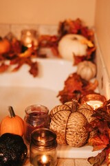 Bathtub with a fall leaves and candle décor