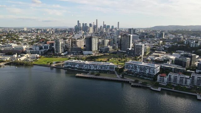 Waterfront Buildings At The Side Of Brisbane River In Newstead Suburb, QLD, Australia. aerial