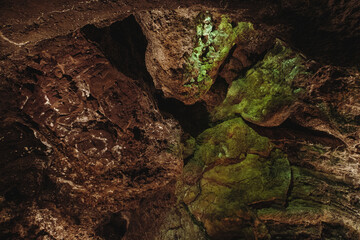 Dark, colorfulTextures of the walls in a lava tube of Canaria island