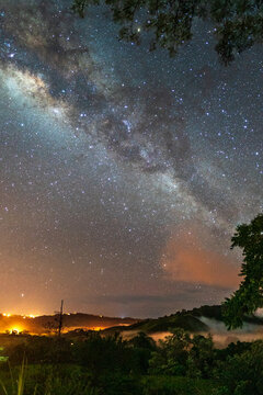 The Milky Way and night lights © Mario Murillo