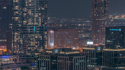 Fototapeta na wymiar Aerial view of Dubai city night timelapse in downtown district.