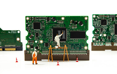 miniature puppets working painting 11 on a computer hardware print