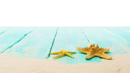 Fototapeta na wymiar Starfishes and sand on wooden boards, template for designers