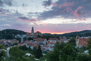 Panoramic view of the historic city of Cesky Krumlov with famous Cesky Krumlov Castle, a UNESCO World Heritage Site since 1992, in beautiful golden morning light at sunrise in fall, Czech Republic