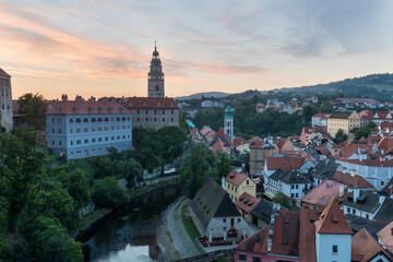 Panoramic view of the historic city of Cesky Krumlov with famous Cesky Krumlov Castle, a UNESCO World Heritage Site since 1992, in beautiful golden morning light at sunrise in fall, Czech Republic