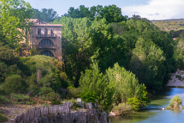 Fototapeta premium Big old house next to the river