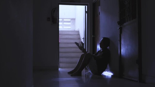 Silhouette of a Man having financial problems with invoices and Credit Cards, Money concept, real estate, problems, Stress, violence.