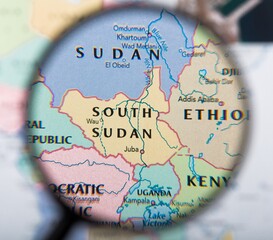 Magnifying Glass Over South Sudan Map - obrazy, fototapety, plakaty