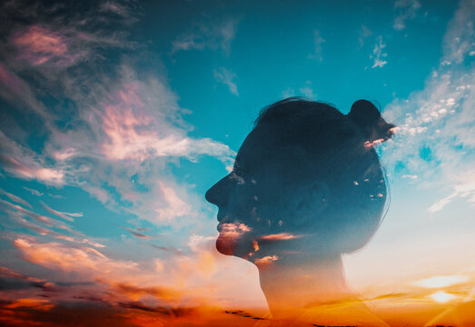 mindfulness and mental health concept double exposure of woman head and sunset sky