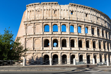 Fototapeta na wymiar Colosseum, 1st century antique, oval amphitheatre in the centre of the city, Rome, Italy