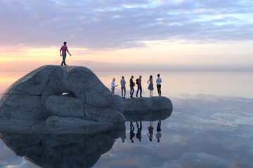 people standing on a big fallen pointing hand