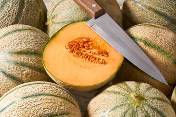 Whole and sliced ​​melon, honeydew melon or melon cantaloupe close up.