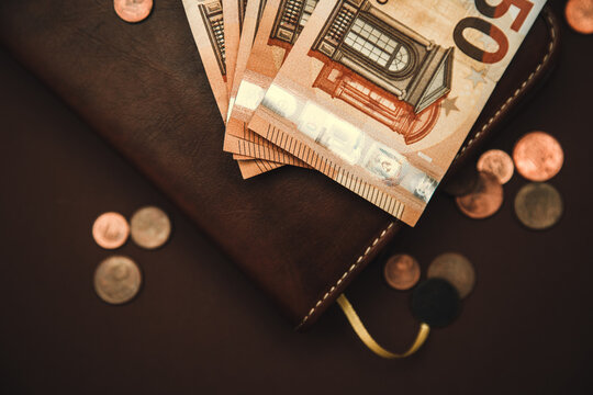 European money lies on a leather book