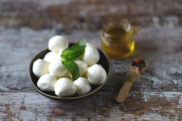 Selective focus. Mozzarella balls in a bowl.