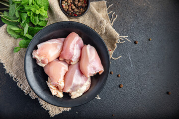 raw chicken or turkey skinless meat thigh boneless pulp poultry fresh meal snack on the table copy space food background rustic  - obrazy, fototapety, plakaty