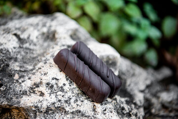 Candy box on grey stone natural background. Close-up. Copy space. Soft focus. Eco sweets. Vegan organic food. 