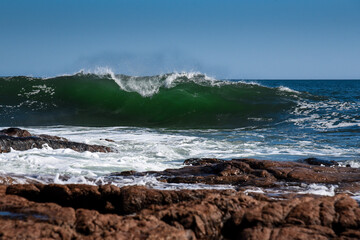 waves crashing on rocks