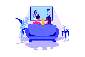 A couple watching tv in the living room