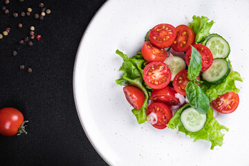 vegetables salad mix petals lettuce leaves, tomato, cucumber, onion vitamin aperitif fresh meal snack on the table copy space food background keto or paleo diet veggie vegan or vegetarian  no meat