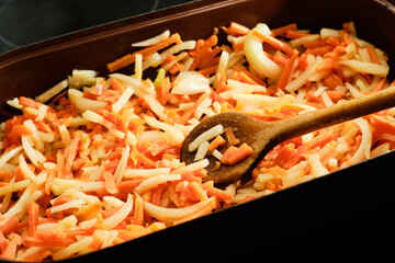 Preparing vegetables on cooking pan
