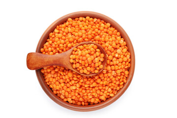 Red lentils with spoon and bowl isolated on white background