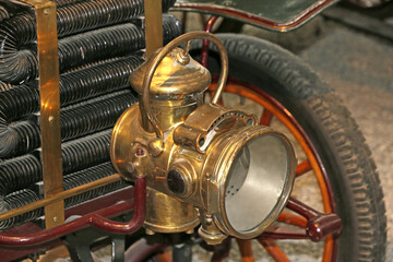 Brass headlamo on a vintage car