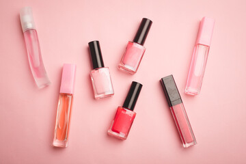 Pink nail polish on a pink copy space background. An article about nail polishes. Gel polish. An article about cosmetics. Decorative cosmetics .