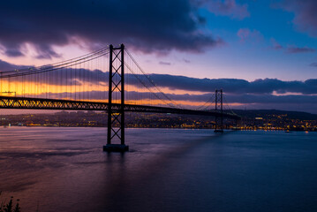 Fototapeta premium 25th of April Bridge at dusk - Lisbon, Portugal.
